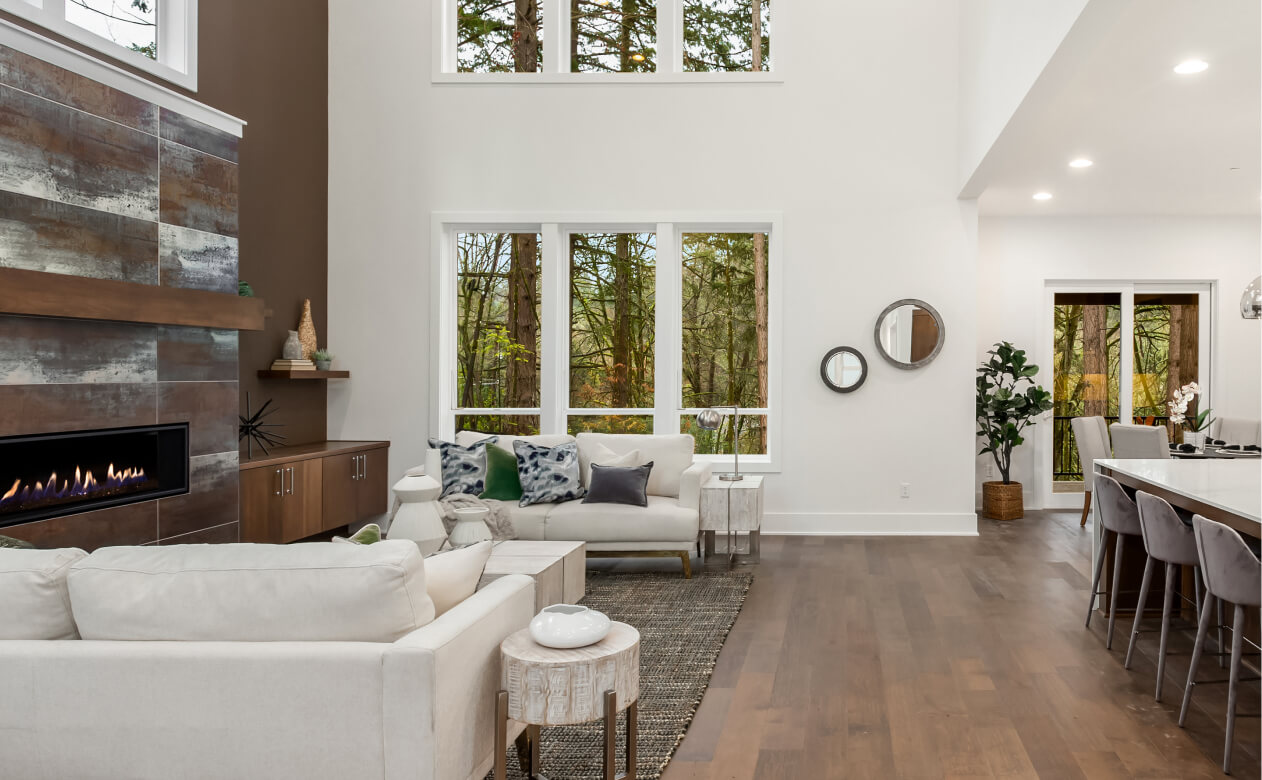 wood look laminate flooring in a stunning open concept kitchen and living room